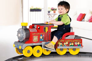 toy riding train on track